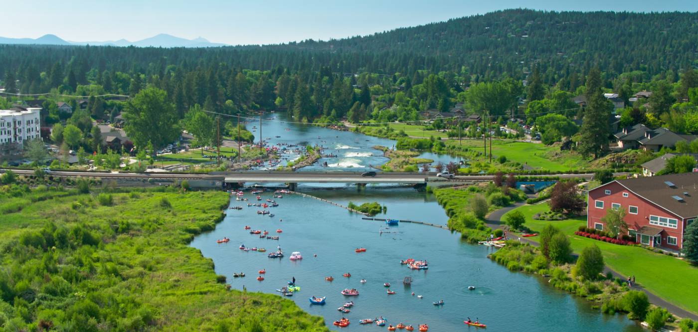 People floating the Deschutes River in Bend Oregon during the summer